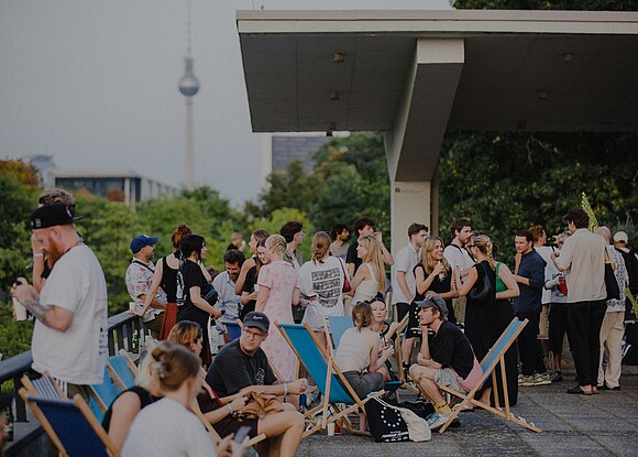 Visitors at Forward Festival Berlin with TV-Tower in the Background